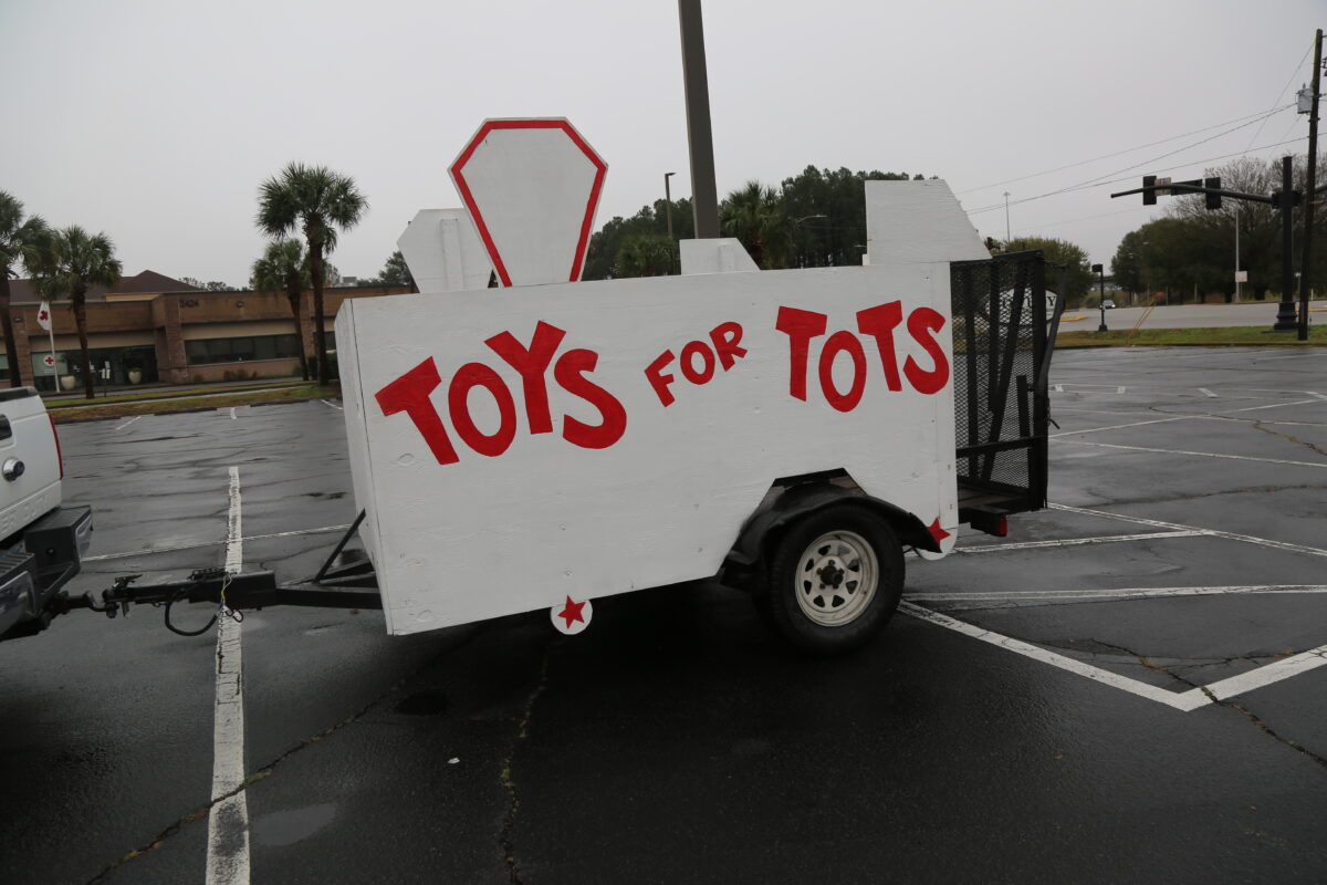 NCPD leads caravan to pickup toys for Toys for Tots City of North