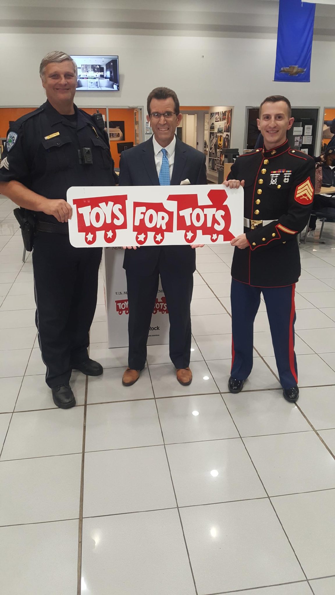 NCPD officer helps kick off 20 Days of Giving for Toys for Tots City