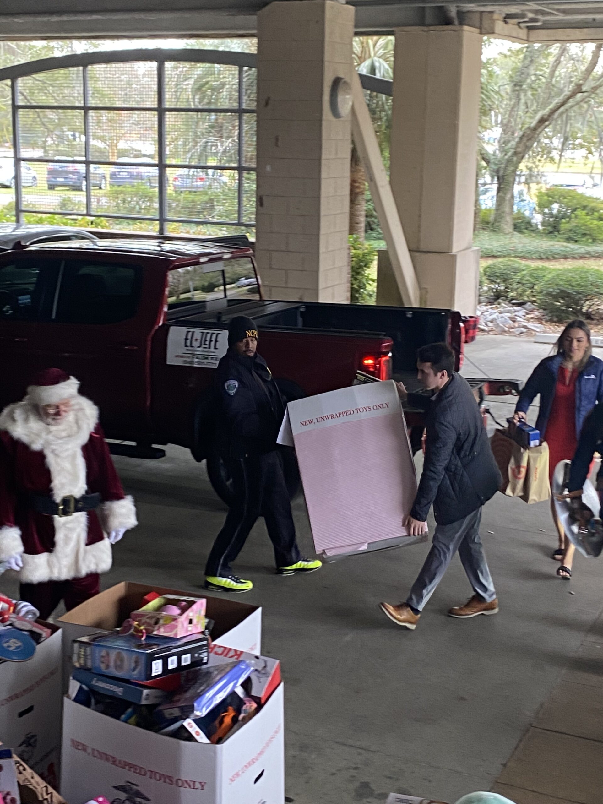 NCPD officers, recruits help with Toys for Tots blitz City of North